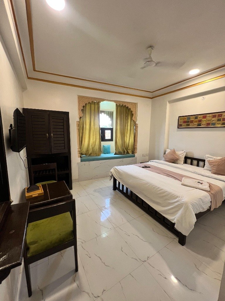 Grand Heritage Room with Rajasthani Jharokha window